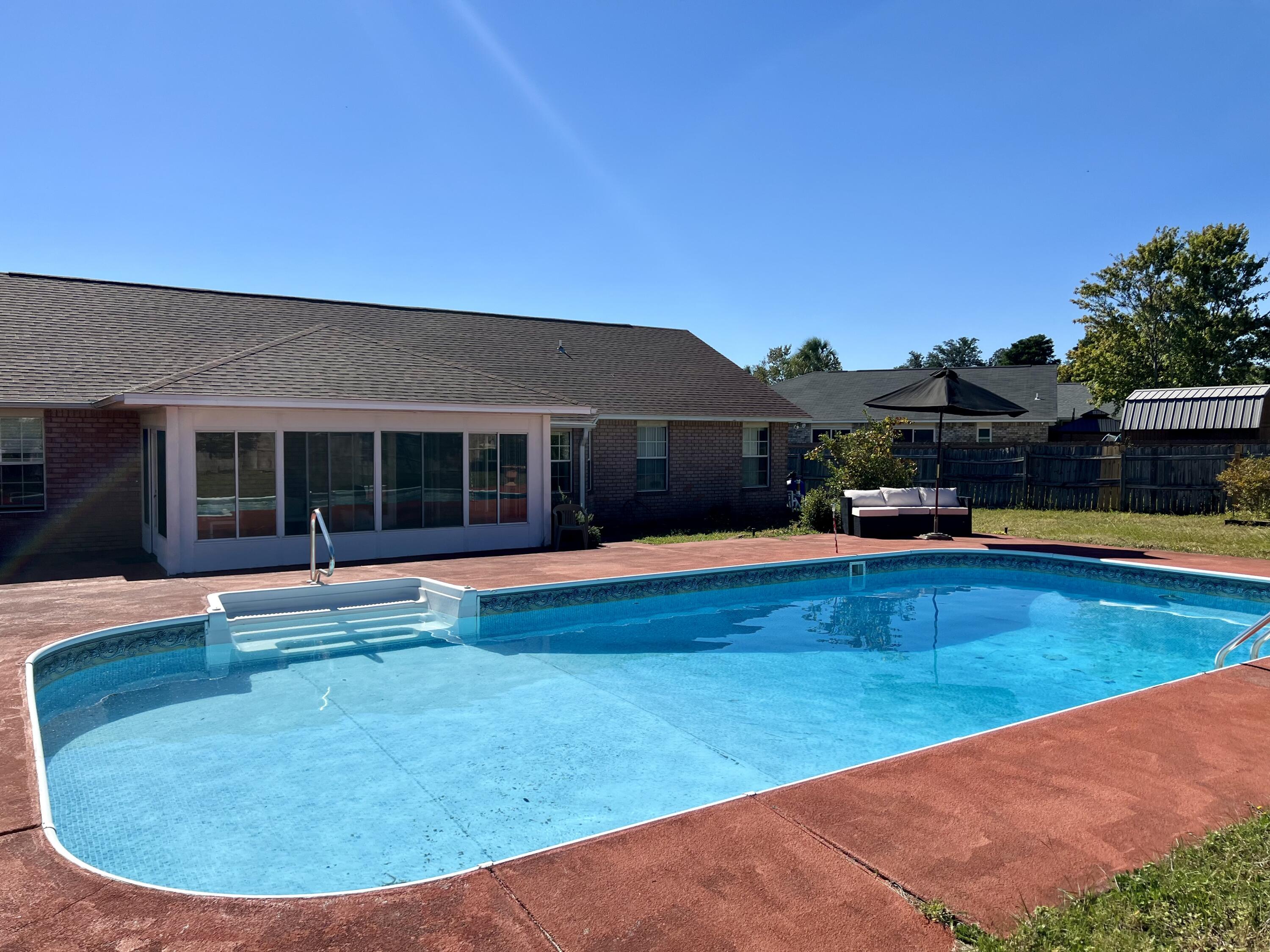 1937 Jessica Way Navarre, FL 32566 - Photo 19 of 39 Inground Pool