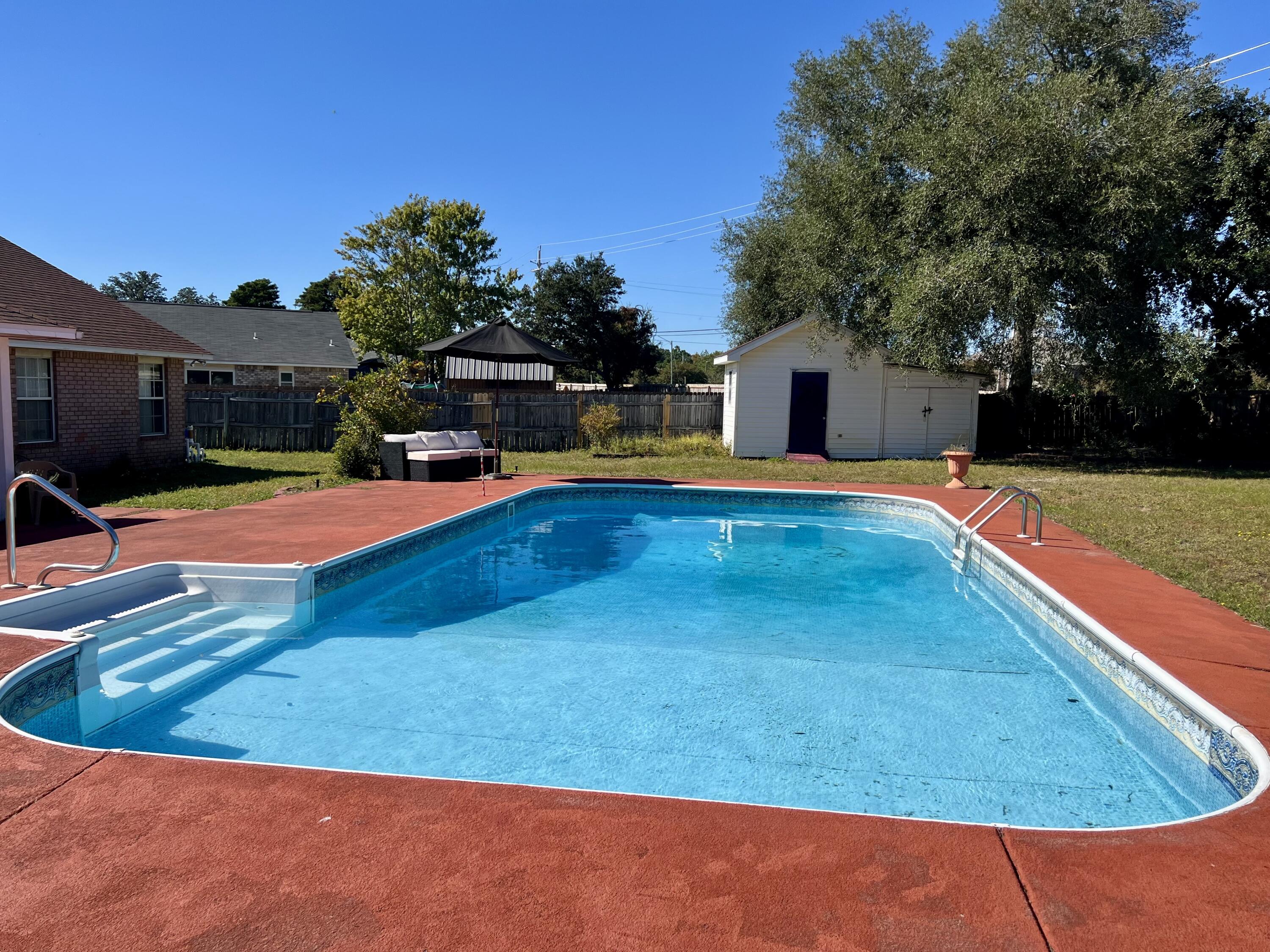 1937 Jessica Way Navarre, FL 32566 - Photo 21 of 39 Inground Pool