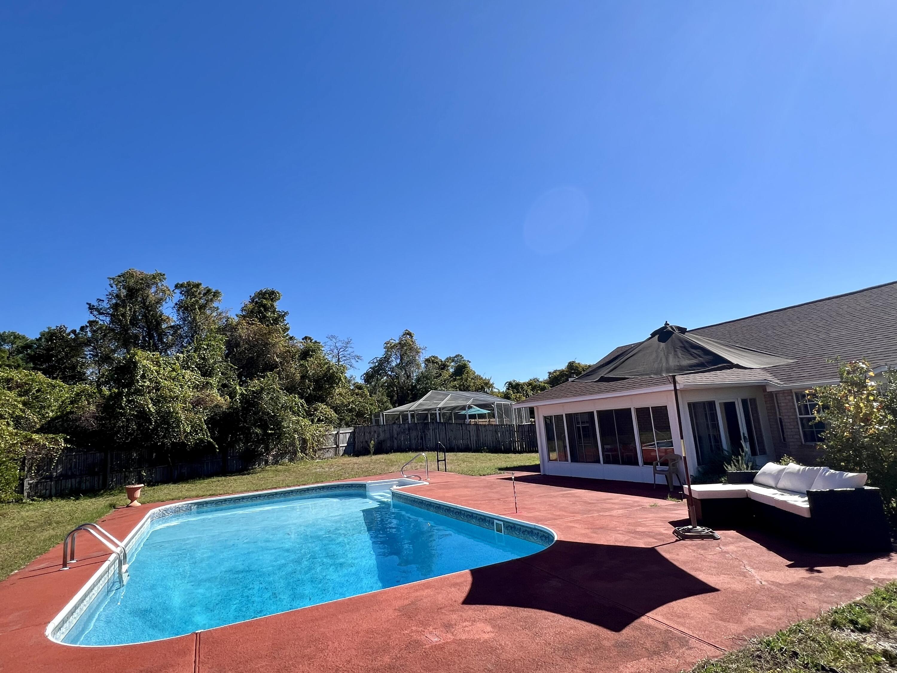 1937 Jessica Way Navarre, FL 32566 - Photo 22 of 39 Inground Pool