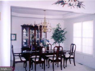 310 Kentucky Avenue Sinking Spring, PA 19608 - Photo 3 of 6 a view of a dining room with furniture and chandelier