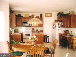 310 Kentucky Avenue Sinking Spring, PA 19608 - Photo 4 of 6 a view of a dining room with furniture