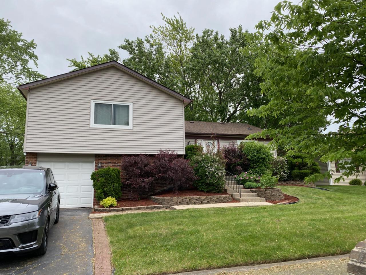 217 Pheasant Road Matteson, IL 60443 - Photo 1 of 27 a view of a house with a yard