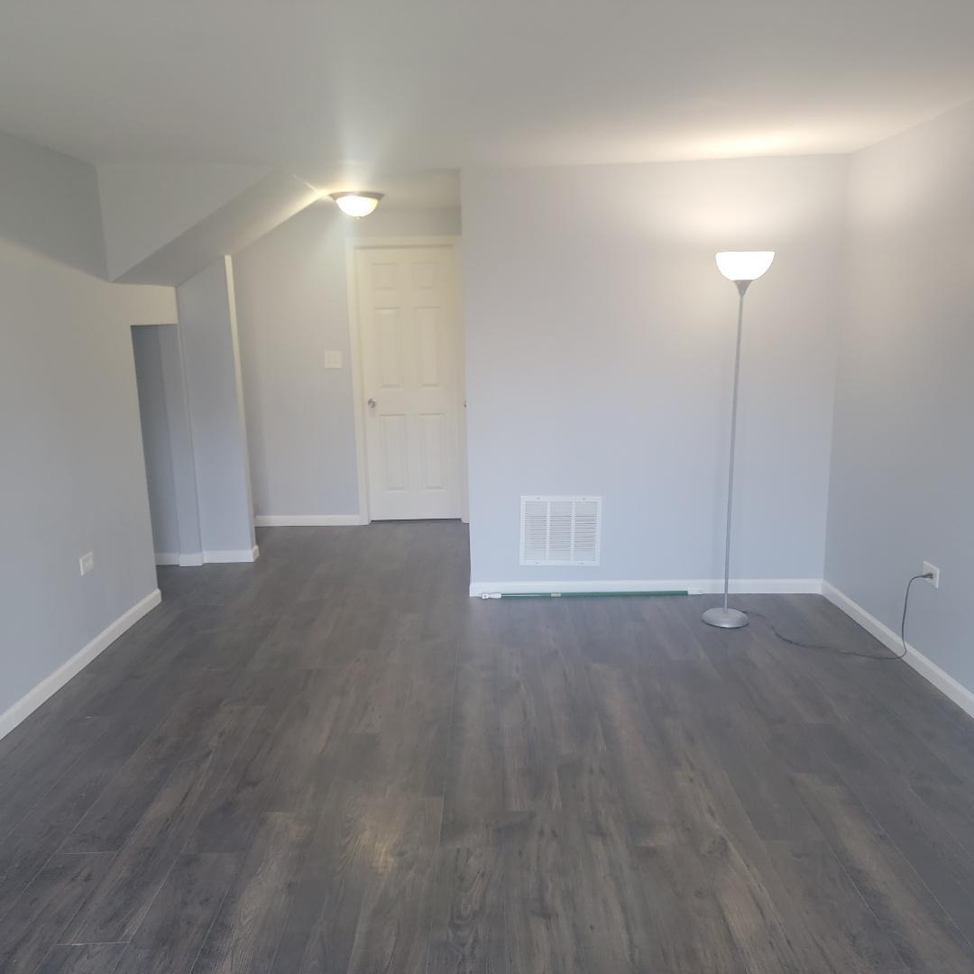 217 Pheasant Road Matteson, IL 60443 - Photo 19 of 27 a view of empty room with wooden floor