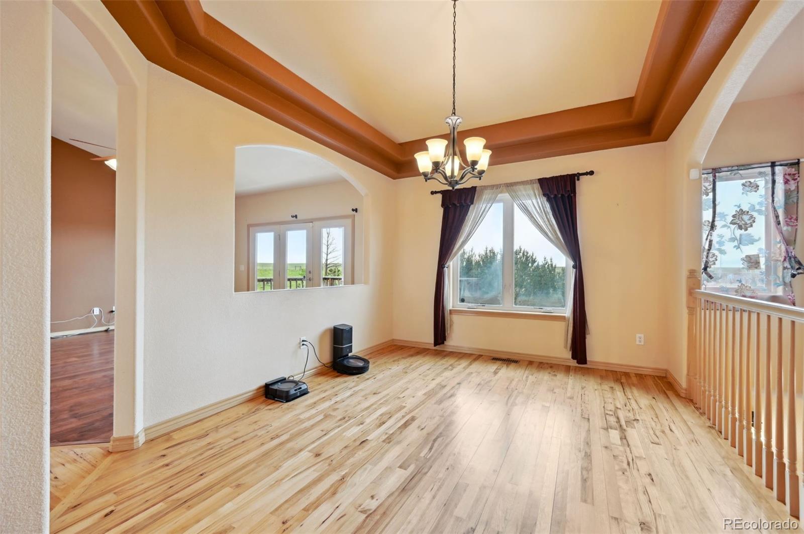 1625 North Yoder Road Yoder, CO 80864 - Photo 14 of 50 a view of livingroom with window and hardwood floor