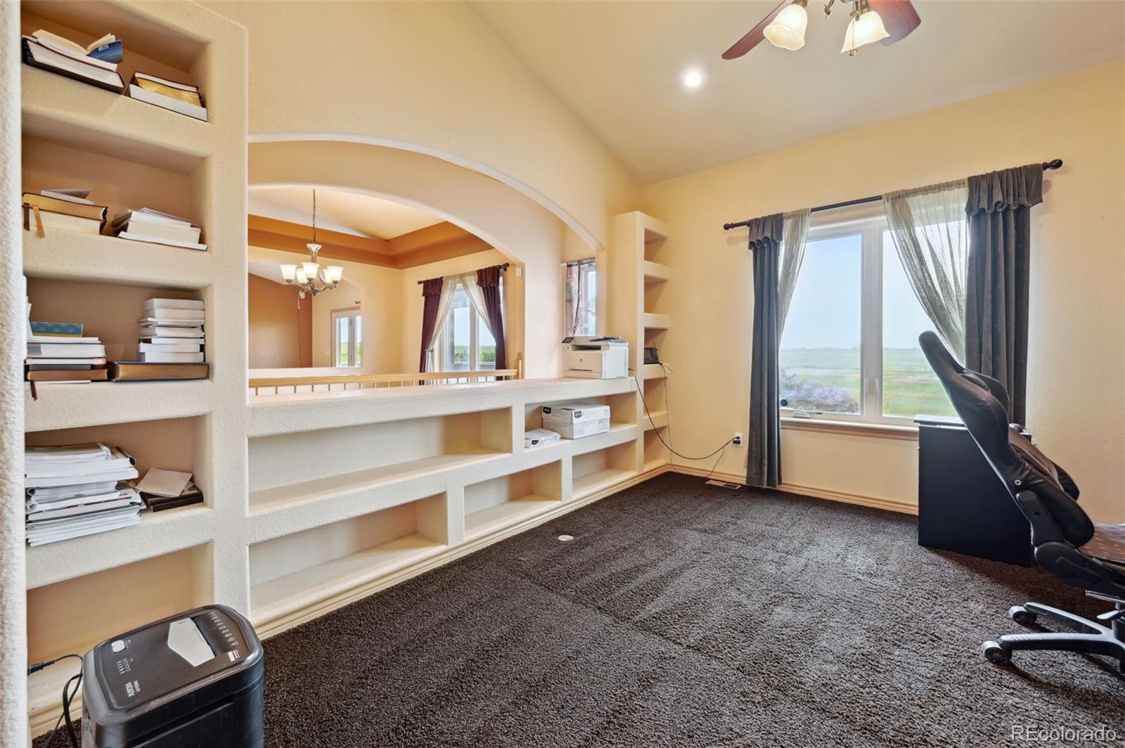 1625 North Yoder Road Yoder, CO 80864 - Photo 15 of 50 a view of an empty room with a window