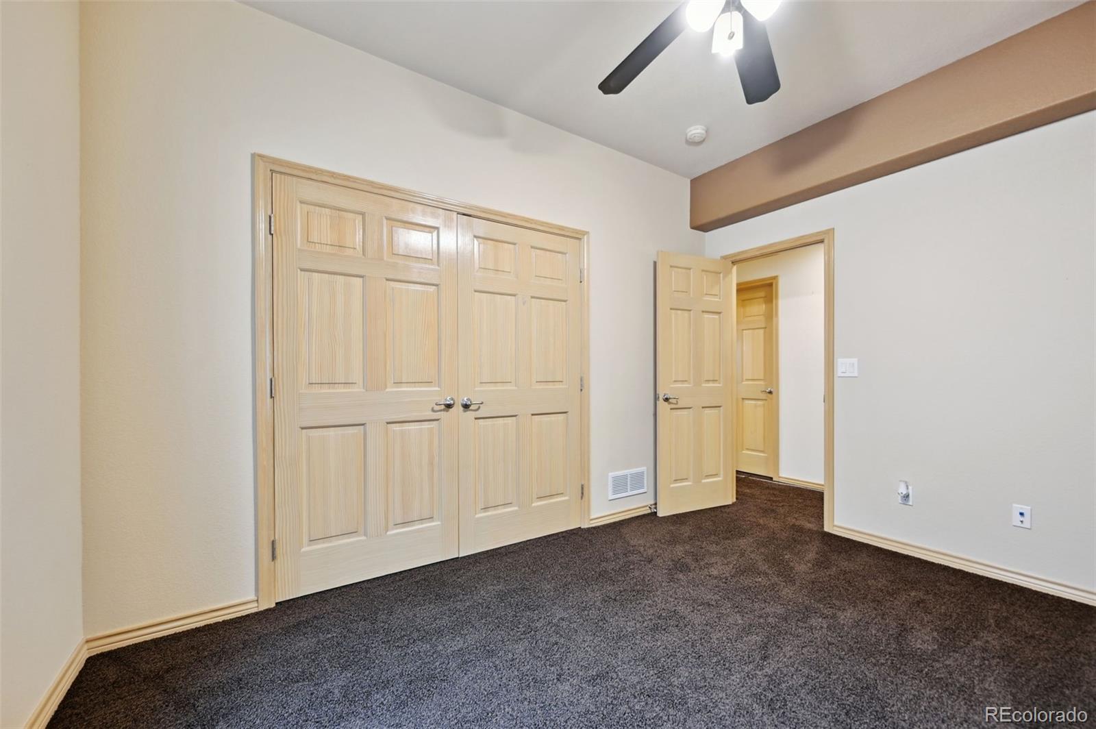 1625 North Yoder Road Yoder, CO 80864 - Photo 31 of 50 an empty room with closet area