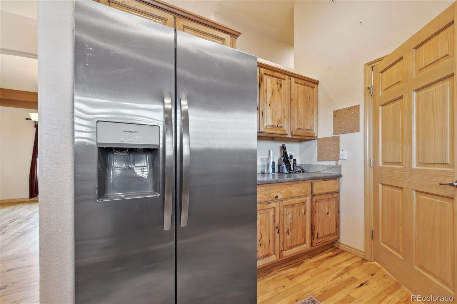 1625 North Yoder Road Yoder, CO 80864 - Photo 7 of 50 a bathroom with a granite countertop sink mirror and shower
