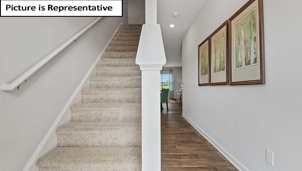7120 North Mill Road Charlotte, NC 28216 - Photo 2 of 26 a view of entryway and hall with wooden floor