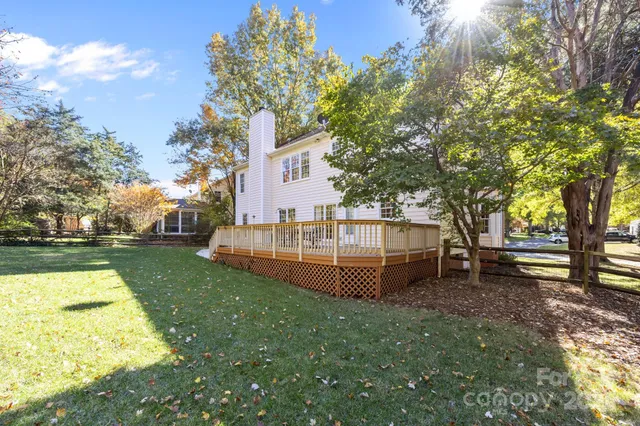 a view of a park with large trees
