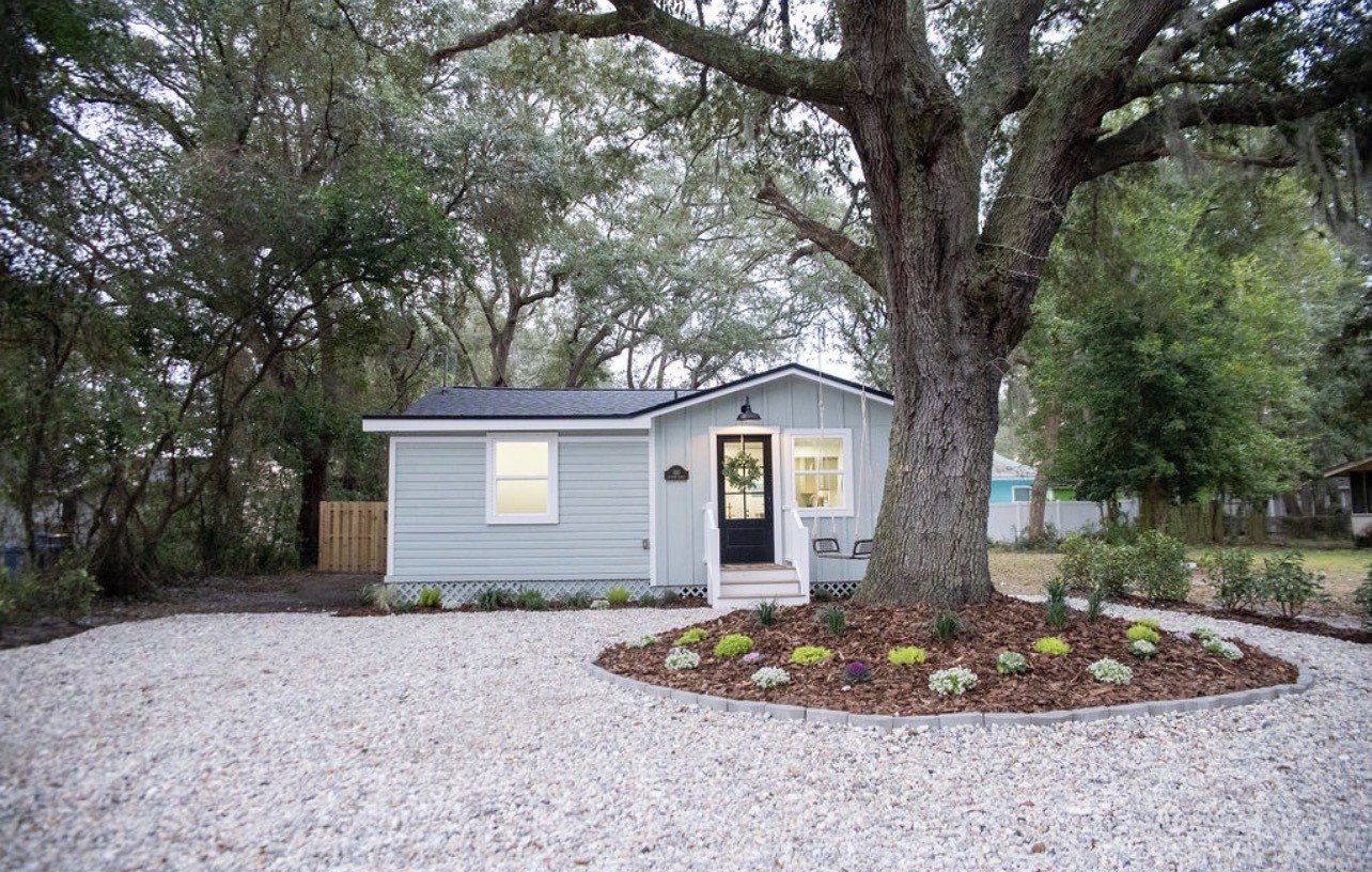 610 Division Street Fernandina Beach, FL 32034 - Photo 1 of 43 a front view of house with yard and trees