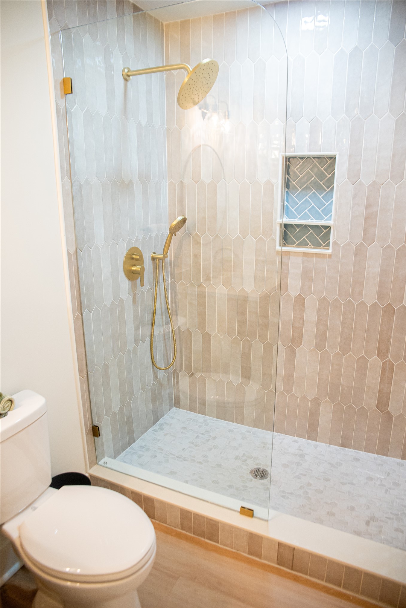 610 Division Street Fernandina Beach, FL 32034 - Photo 29 of 43 a bathroom with a toilet and a shower