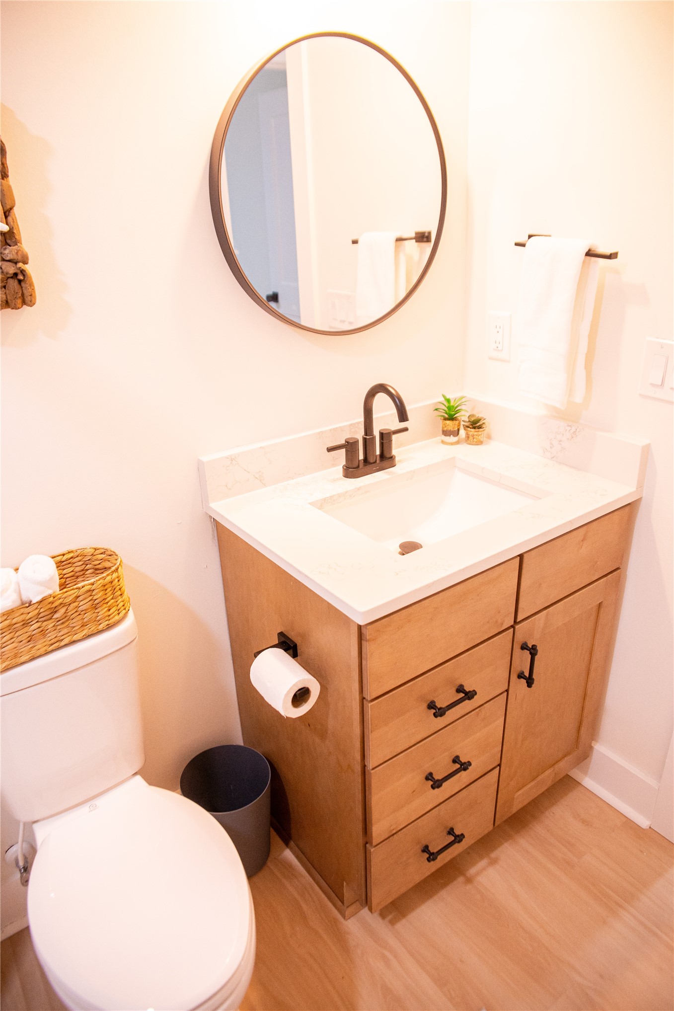 610 Division Street Fernandina Beach, FL 32034 - Photo 30 of 43 a bathroom with a sink mirror vanity and toilet