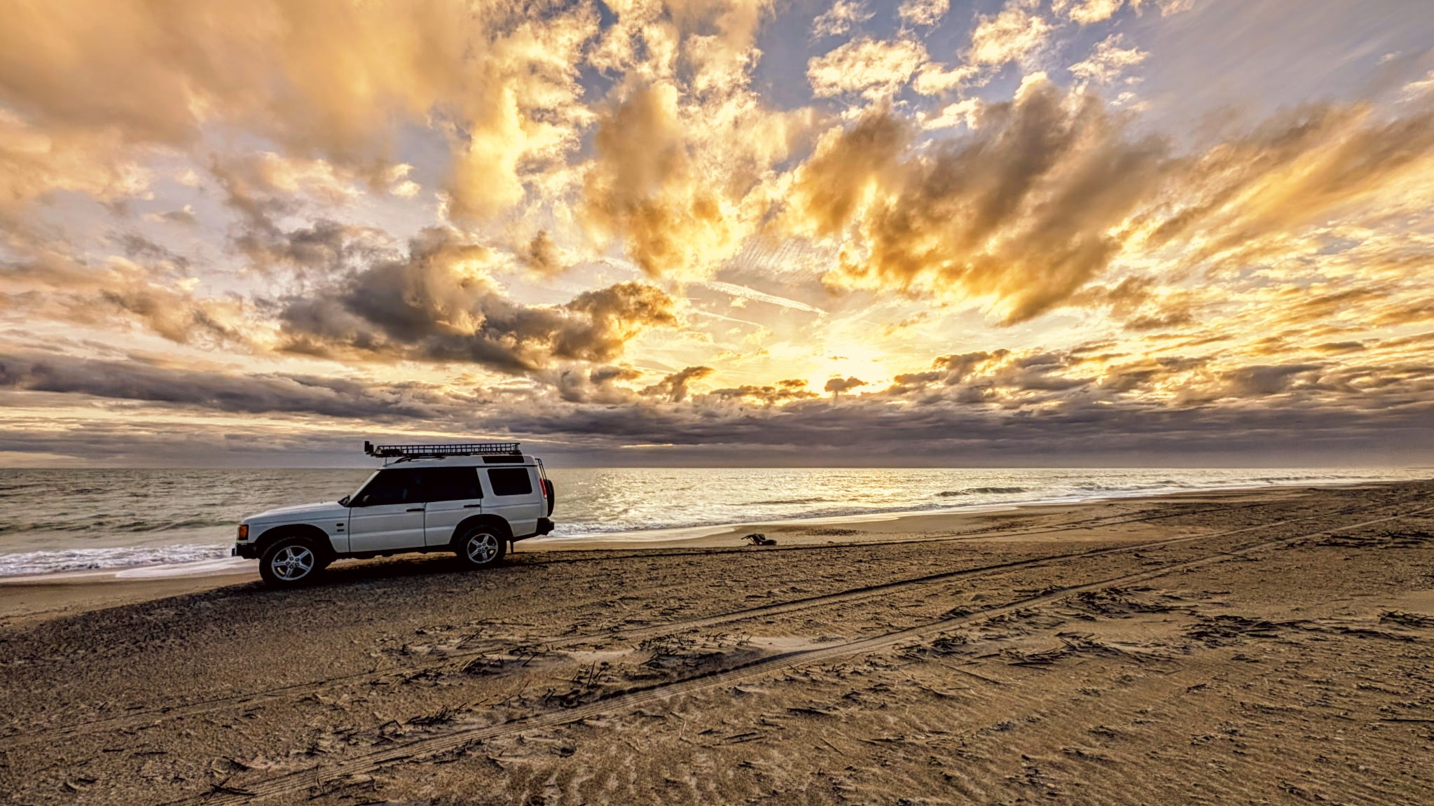 610 Division Street Fernandina Beach, FL 32034 - Photo 41 of 43 a view of car parked on the beach