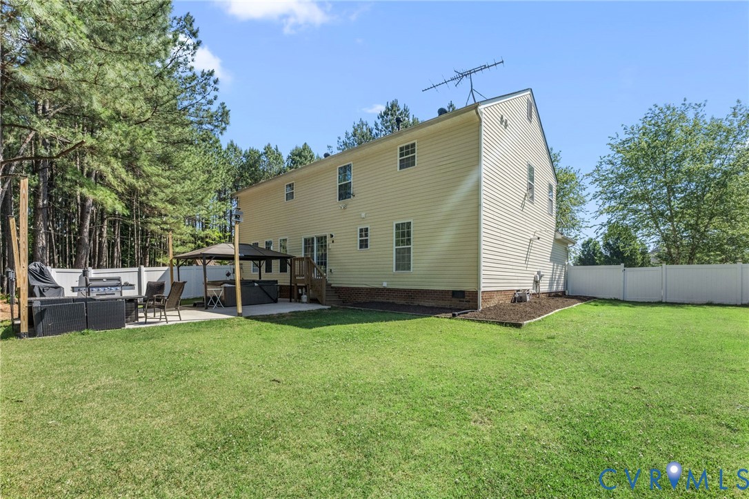 3120 Denise Road Petersburg, VA 23805 - Photo 13 of 51 Spacious backyard featuring a concrete patio area,