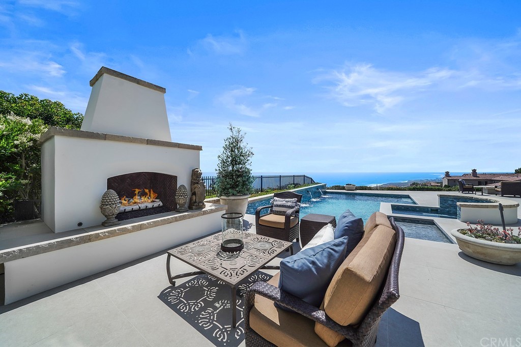 9 Offshore Newport Coast, CA 92657 - Photo 16 of 75 a terrace of a house with outdoor seating