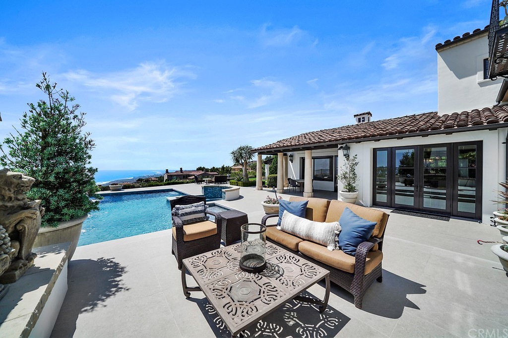 9 Offshore Newport Coast, CA 92657 - Photo 17 of 75 a outdoor space with patio the couches and a potted plant