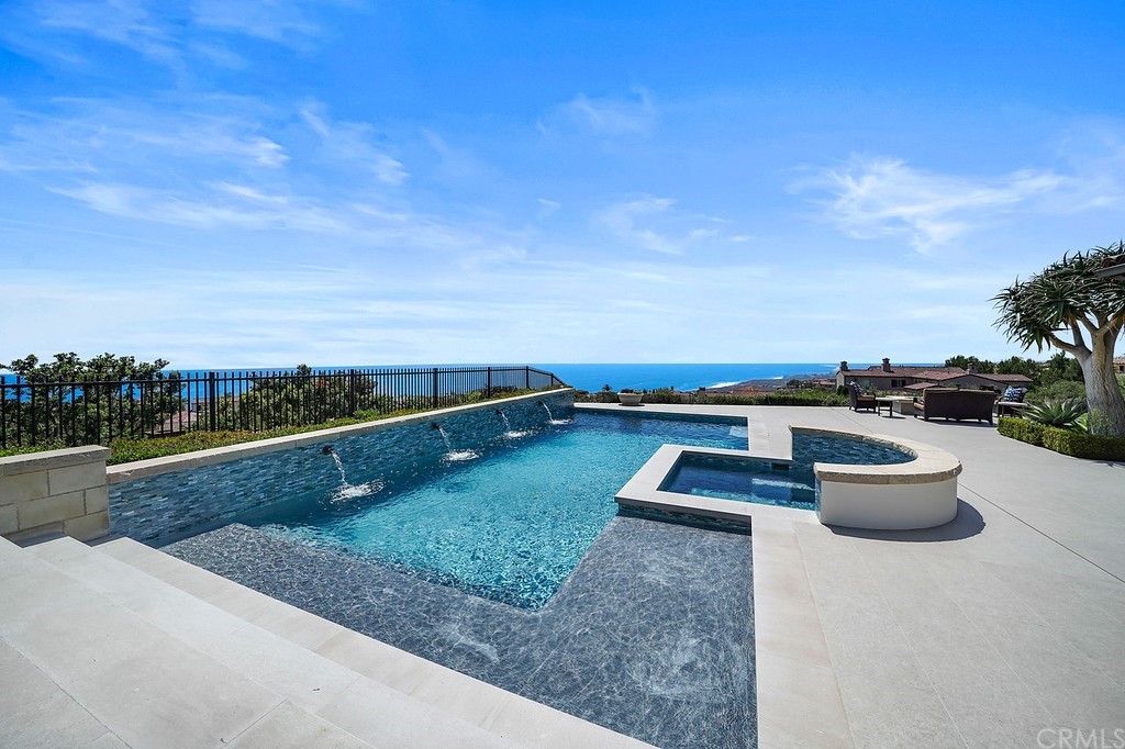 9 Offshore Newport Coast, CA 92657 - Photo 18 of 75 a view of swimming pool with a yard