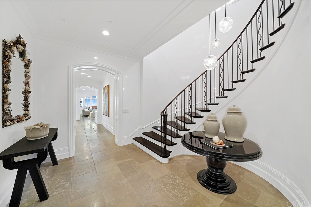 9 Offshore Newport Coast, CA 92657 - Photo 29 of 75 a view of entryway and hall with wooden floor