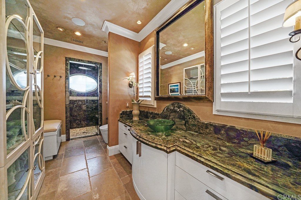 9 Offshore Newport Coast, CA 92657 - Photo 40 of 75 a kitchen with sink and refrigerator