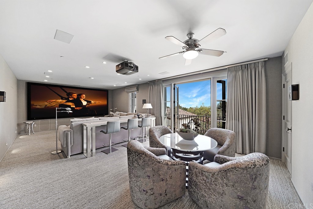 9 Offshore Newport Coast, CA 92657 - Photo 42 of 75 a living room with furniture and a flat screen tv