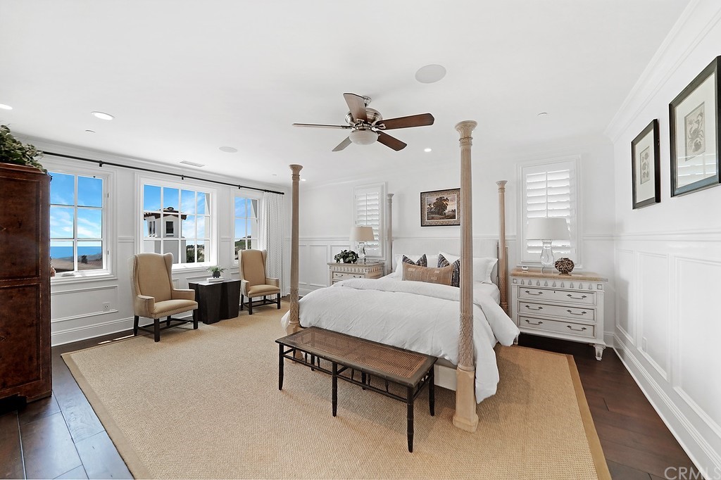 9 Offshore Newport Coast, CA 92657 - Photo 53 of 75 a bed room with a bed and a chair