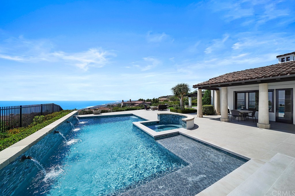 9 Offshore Newport Coast, CA 92657 - Photo 57 of 75 a view of a house with swimming pool and sitting area