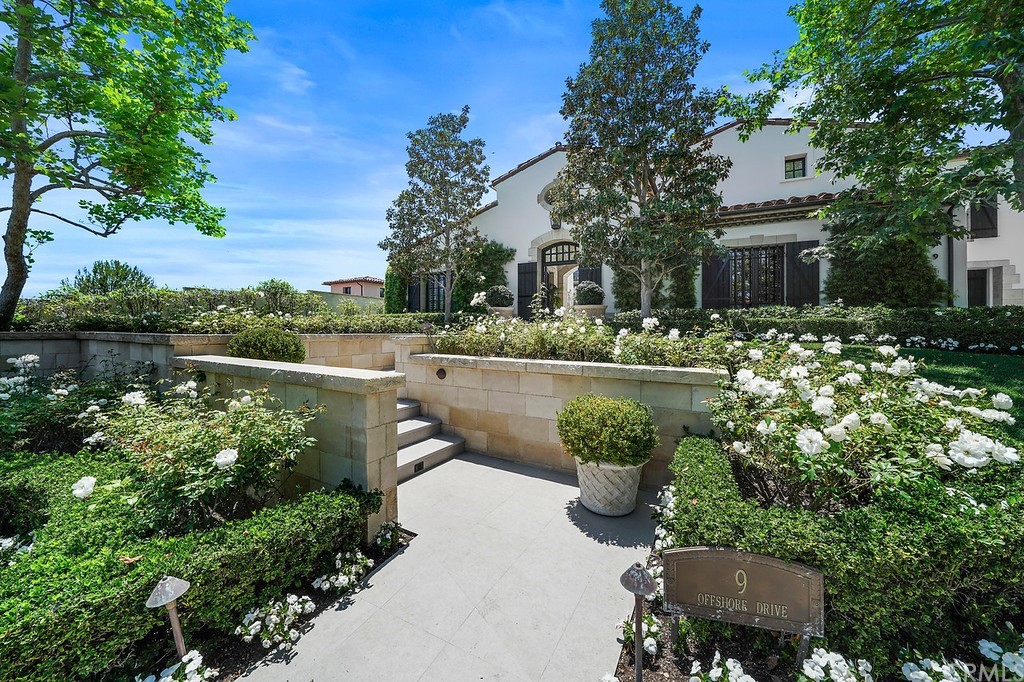 9 Offshore Newport Coast, CA 92657 - Photo 6 of 75 a view of a lake with a house