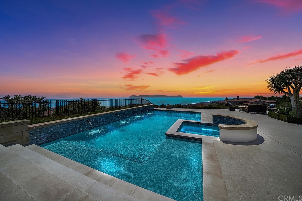 9 Offshore Newport Coast, CA 92657 - Photo 74 of 75 a view of a lake with a garden