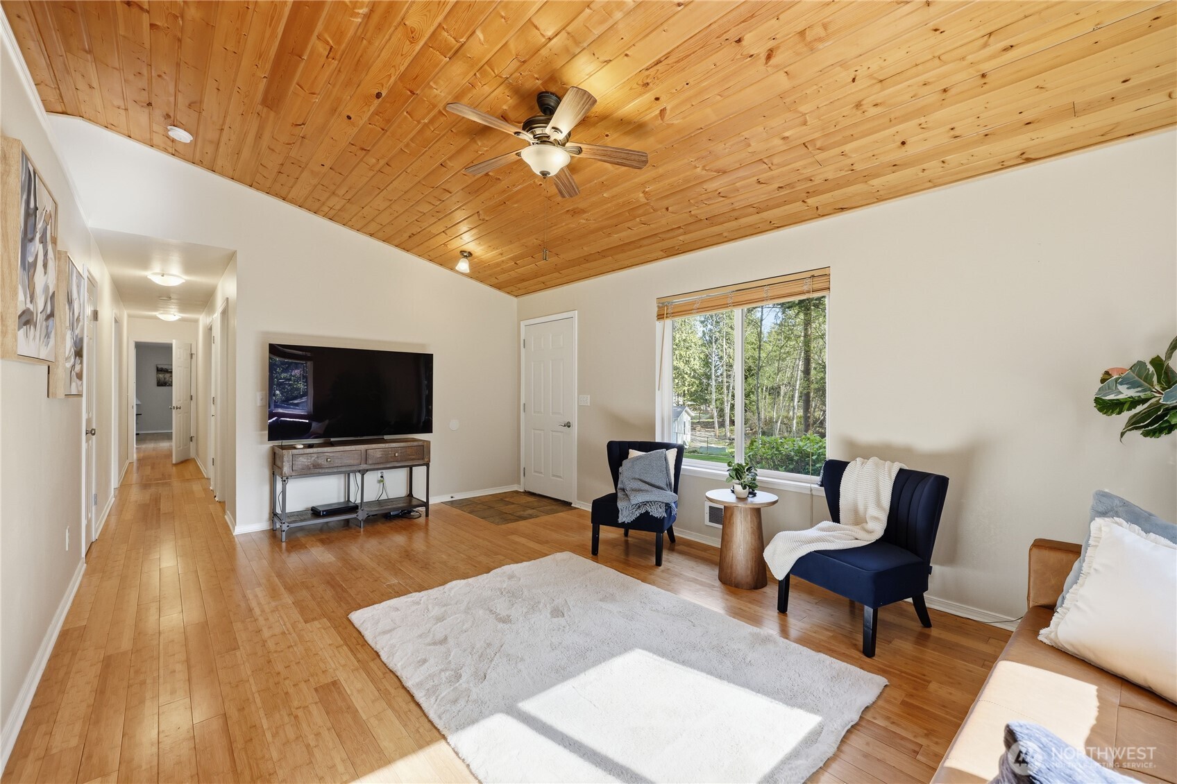 70 Salal Way Sequim, WA 98382 - Photo 13 of 36 a living room with furniture and a flat screen tv