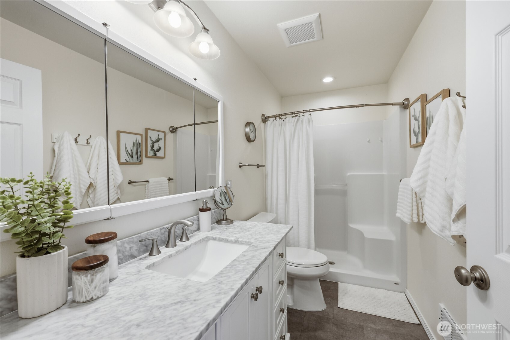 70 Salal Way Sequim, WA 98382 - Photo 20 of 36 a bathroom with a granite countertop sink toilet and shower