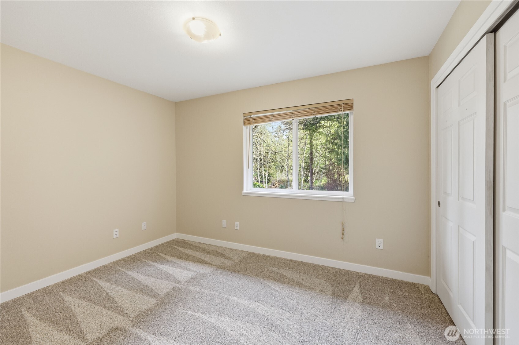 70 Salal Way Sequim, WA 98382 - Photo 24 of 36 an empty room with a window