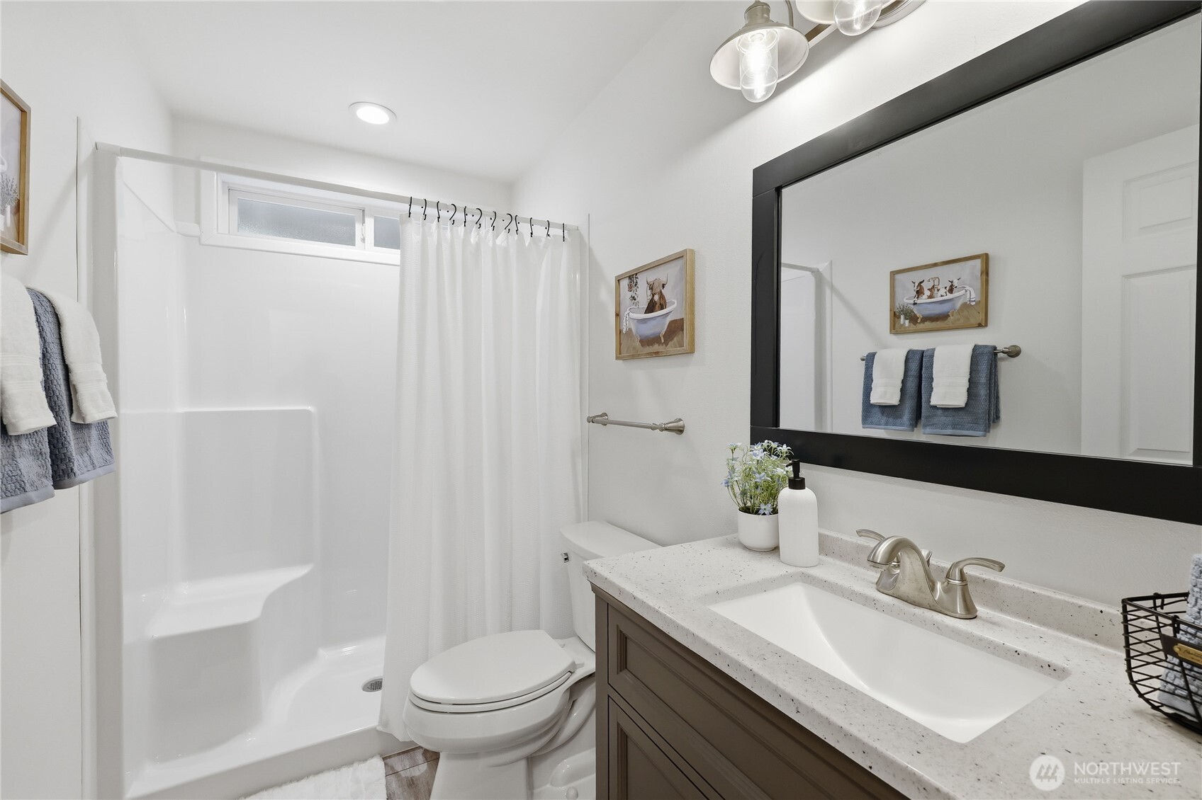 70 Salal Way Sequim, WA 98382 - Photo 25 of 36 a bathroom with a granite countertop sink toilet and shower