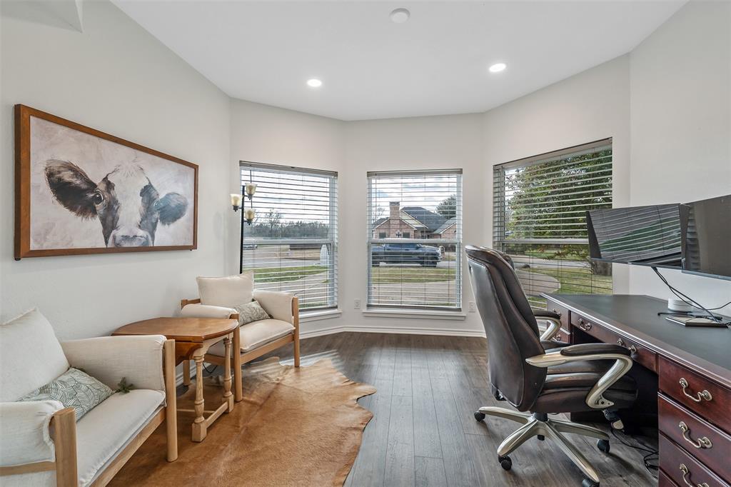300 Rash Lane Terrell, TX 75160 - Photo 7 of 28 a view of a livingroom with workspace and a window