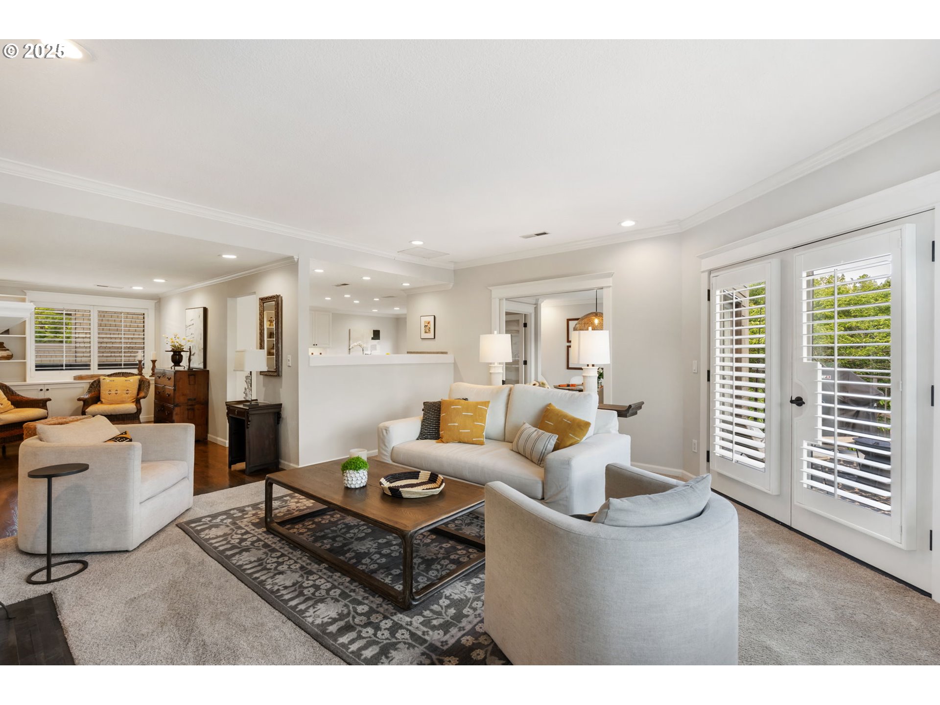 5620 South Riverside Lane, Unit 3 Portland, OR 97239 - Photo 15 of 41 a living room with furniture floor to ceiling window and wooden floor