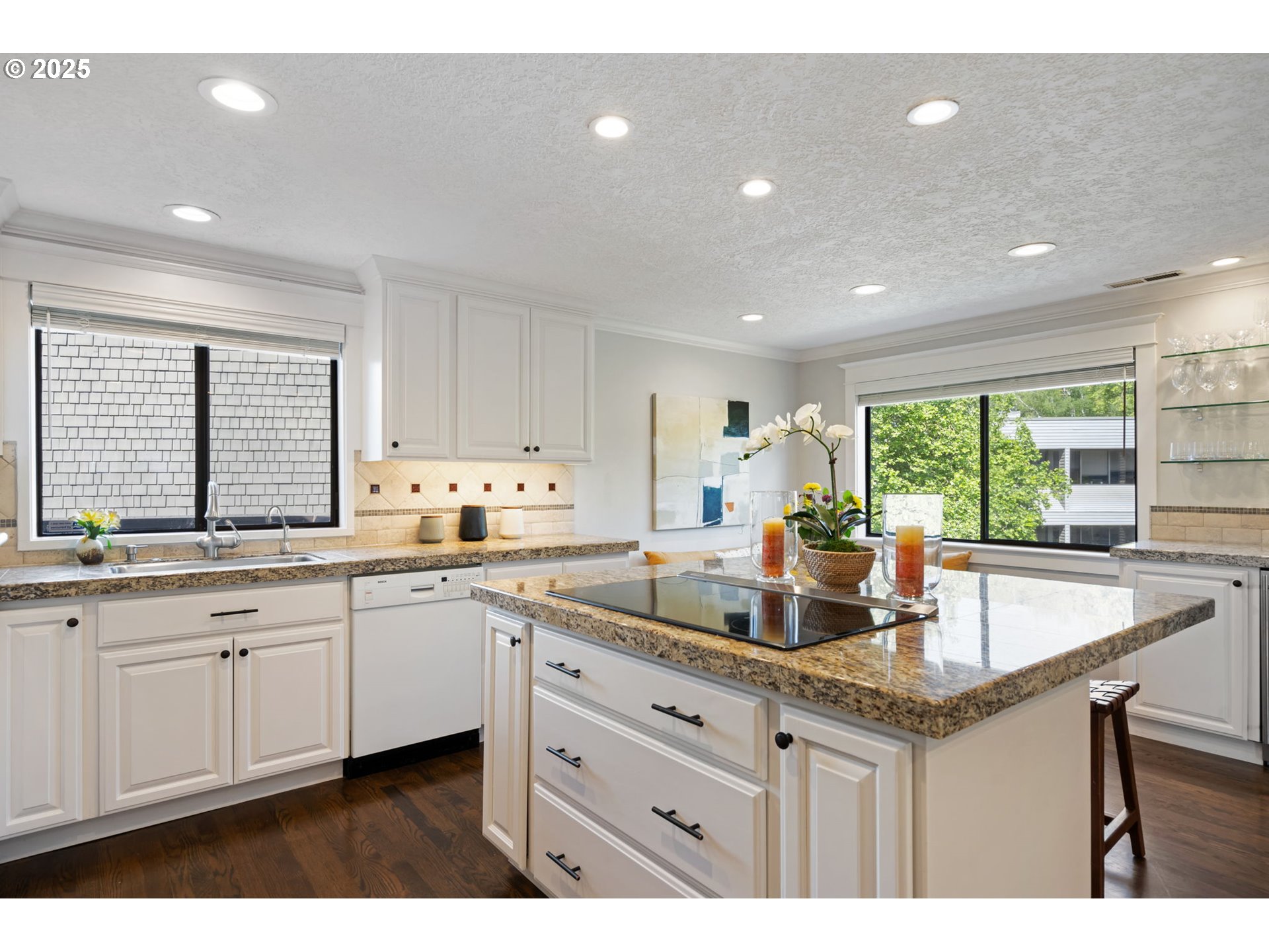 5620 South Riverside Lane, Unit 3 Portland, OR 97239 - Photo 22 of 41 a kitchen with granite countertop a sink and cabinets