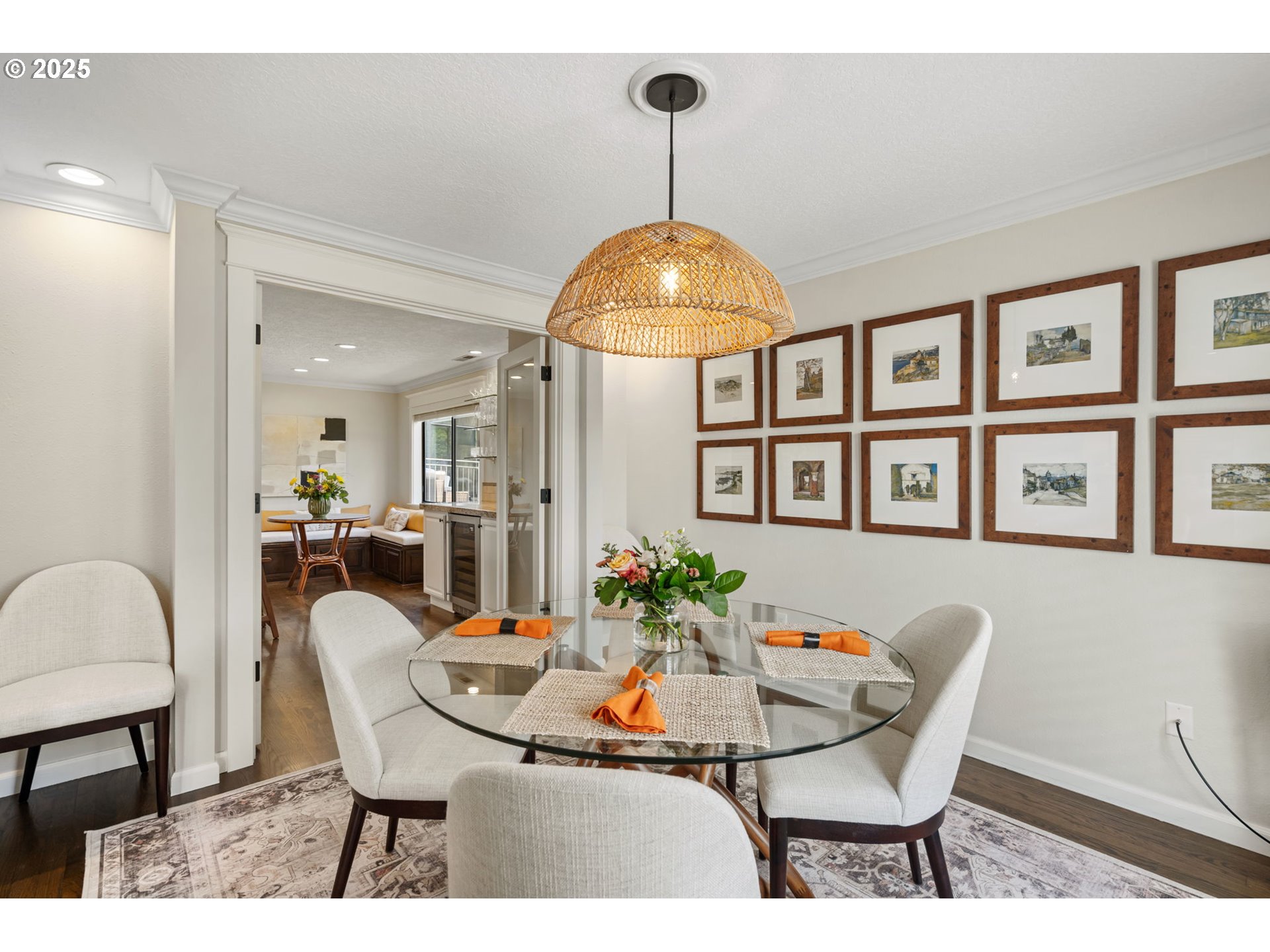 5620 South Riverside Lane, Unit 3 Portland, OR 97239 - Photo 29 of 41 a dining room with furniture a chandelier and wooden floor