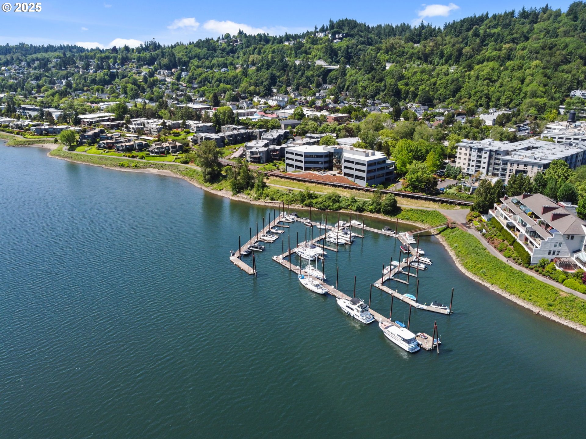 5620 South Riverside Lane, Unit 3 Portland, OR 97239 - Photo 40 of 41 a view of a lake with a city