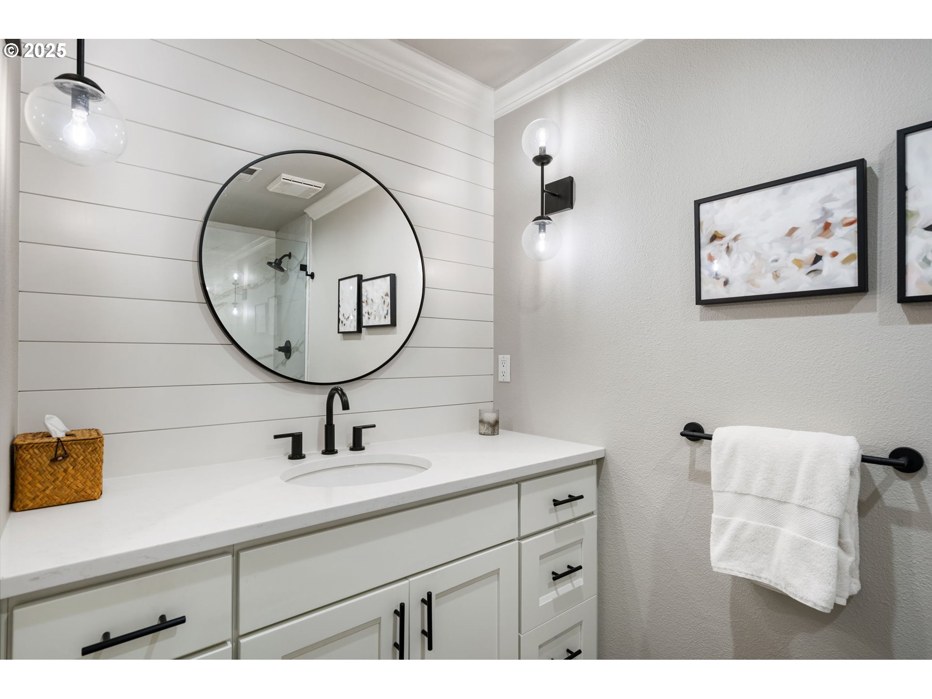 5620 South Riverside Lane, Unit 3 Portland, OR 97239 - Photo 10 of 41 a bathroom with a sink mirror and vanity