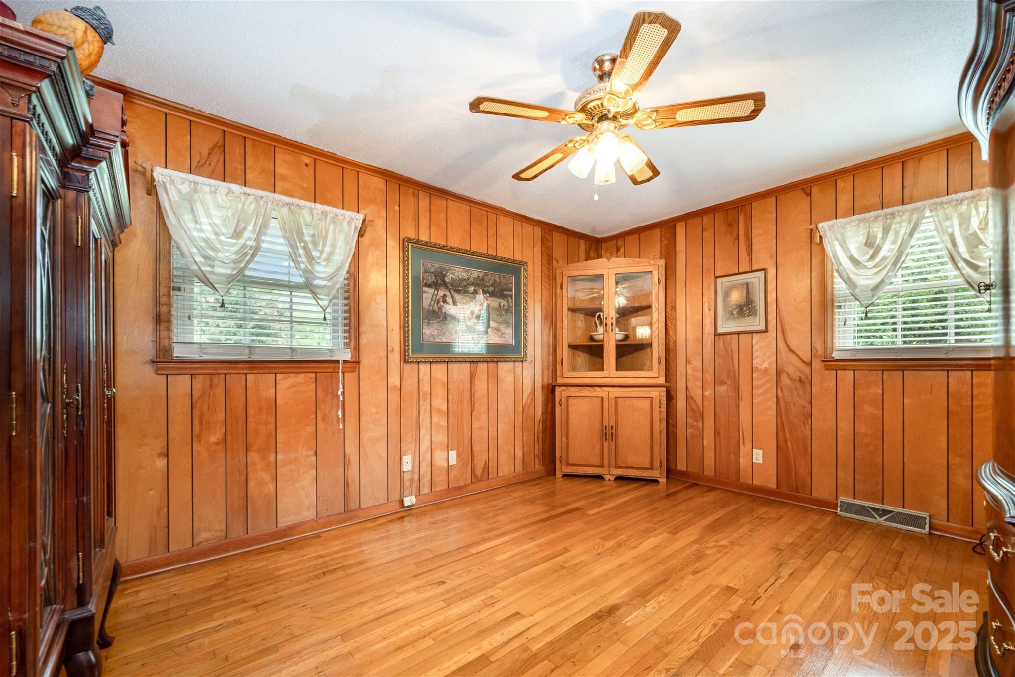 2236 Old Hickory Grove Road Mount Holly, NC 28120 - Photo 13 of 27 wooden floor in an empty room with a window