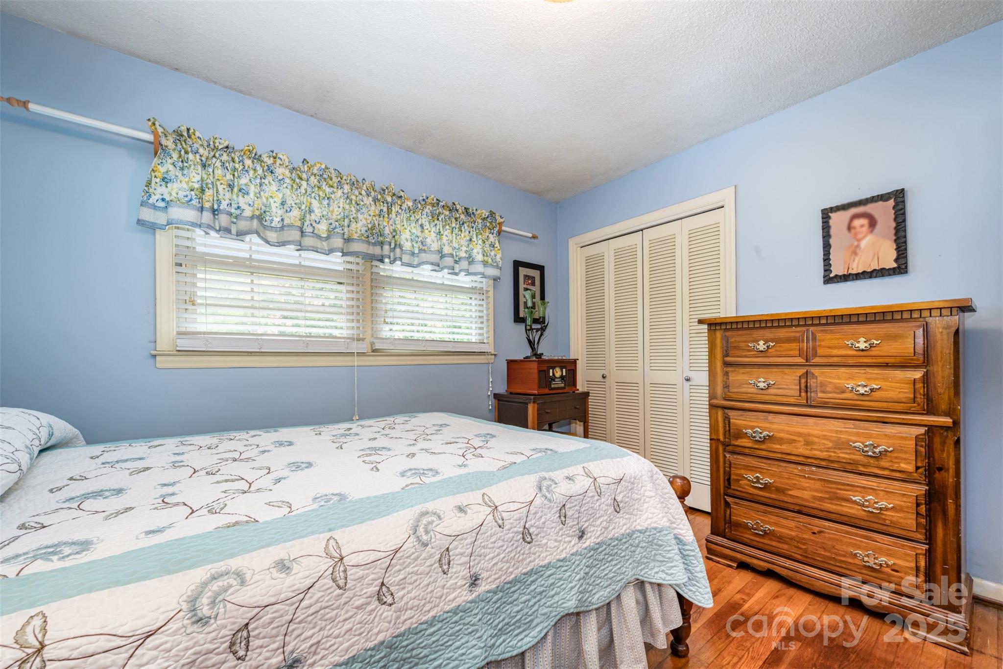 2236 Old Hickory Grove Road Mount Holly, NC 28120 - Photo 16 of 27 a bedroom with a bed and a dresser