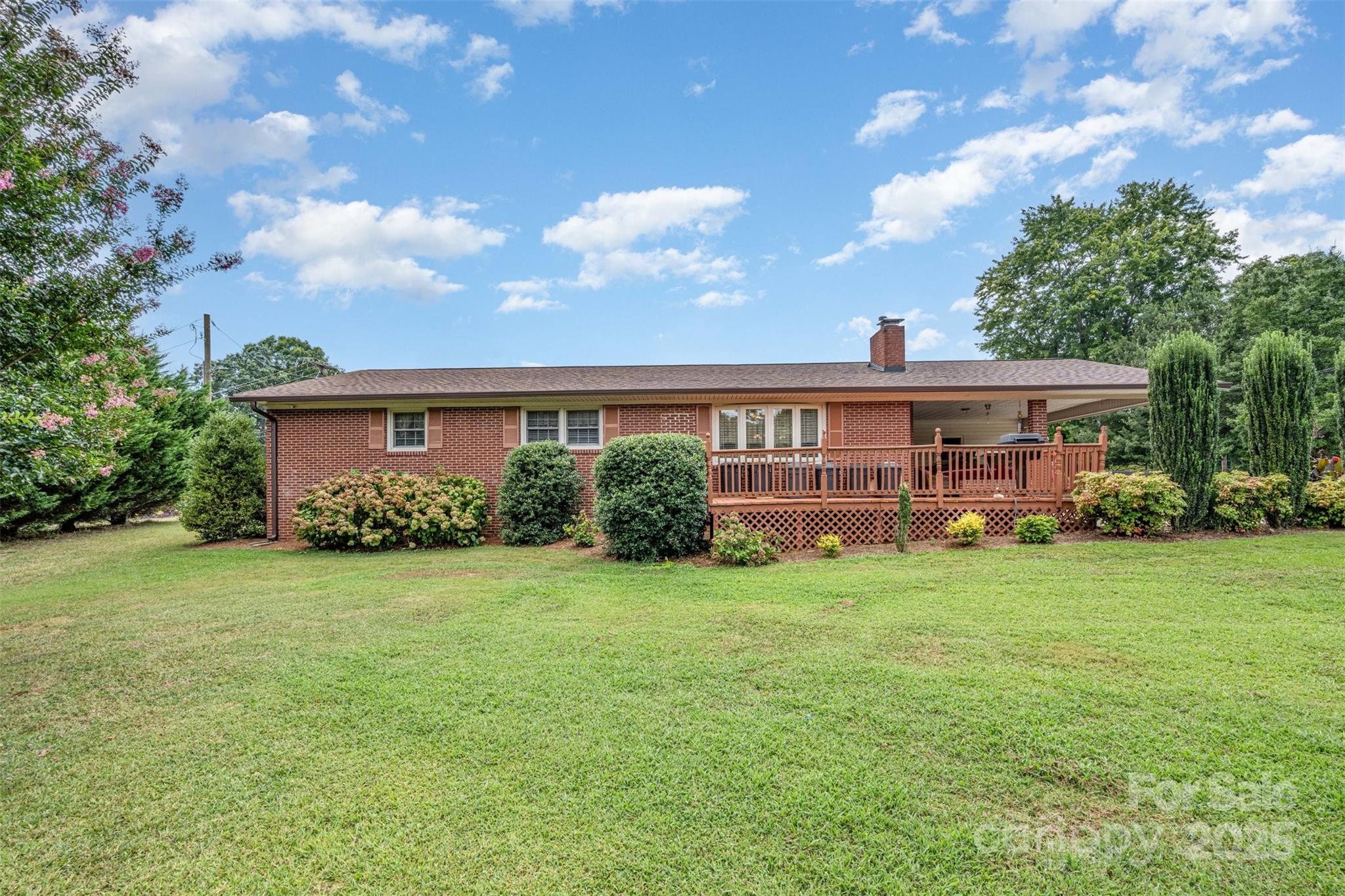 2236 Old Hickory Grove Road Mount Holly, NC 28120 - Photo 22 of 27 a view of a house with backyard and garden