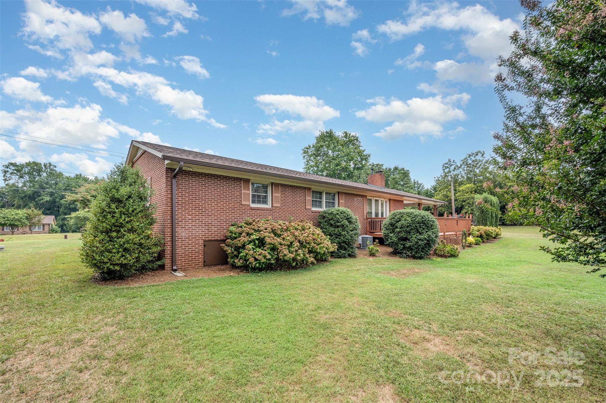 2236 Old Hickory Grove Road Mount Holly, NC 28120 - Photo 23 of 27 a front view of house with garden