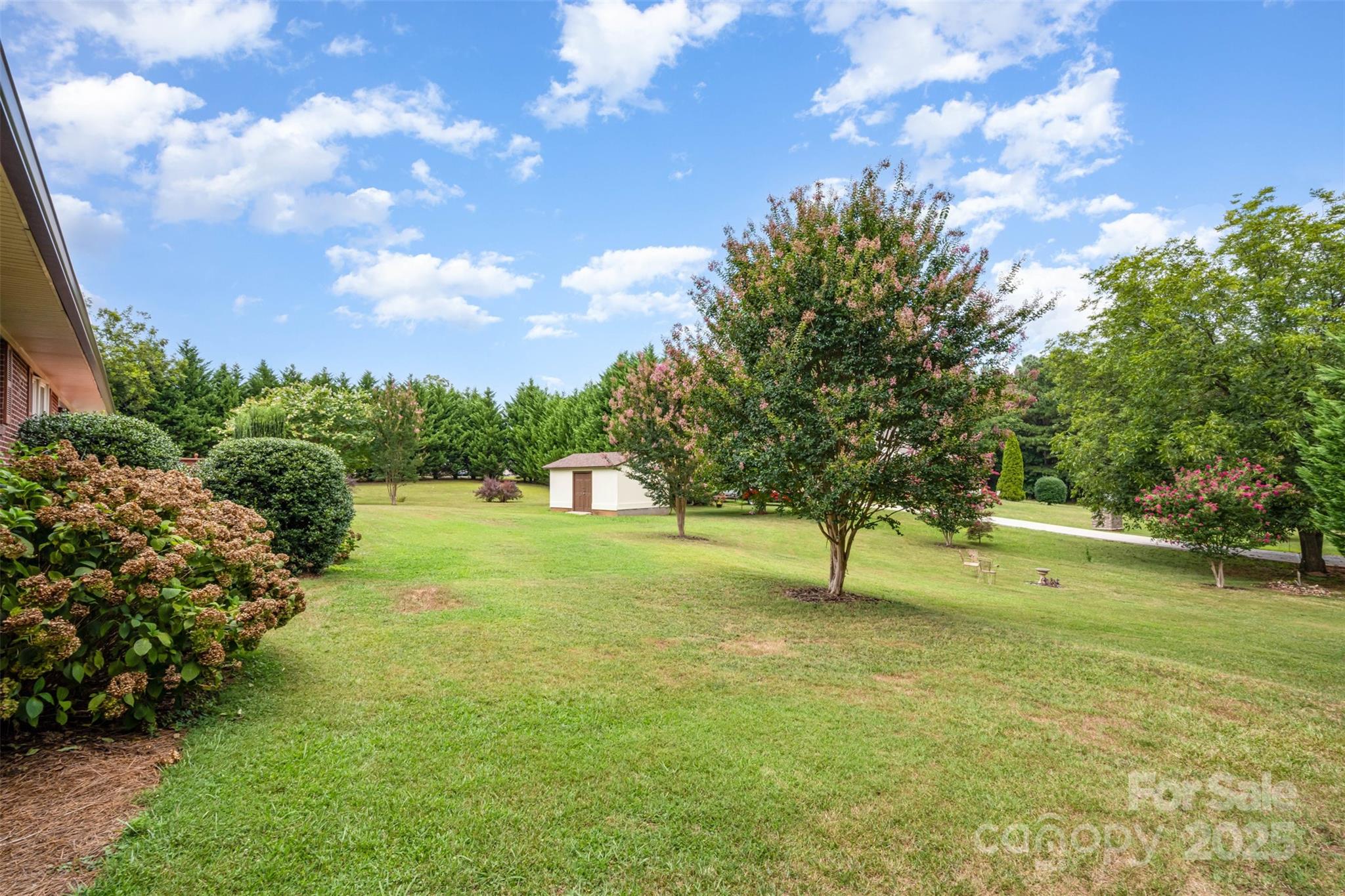 2236 Old Hickory Grove Road Mount Holly, NC 28120 - Photo 24 of 27 a green field with lots of trees