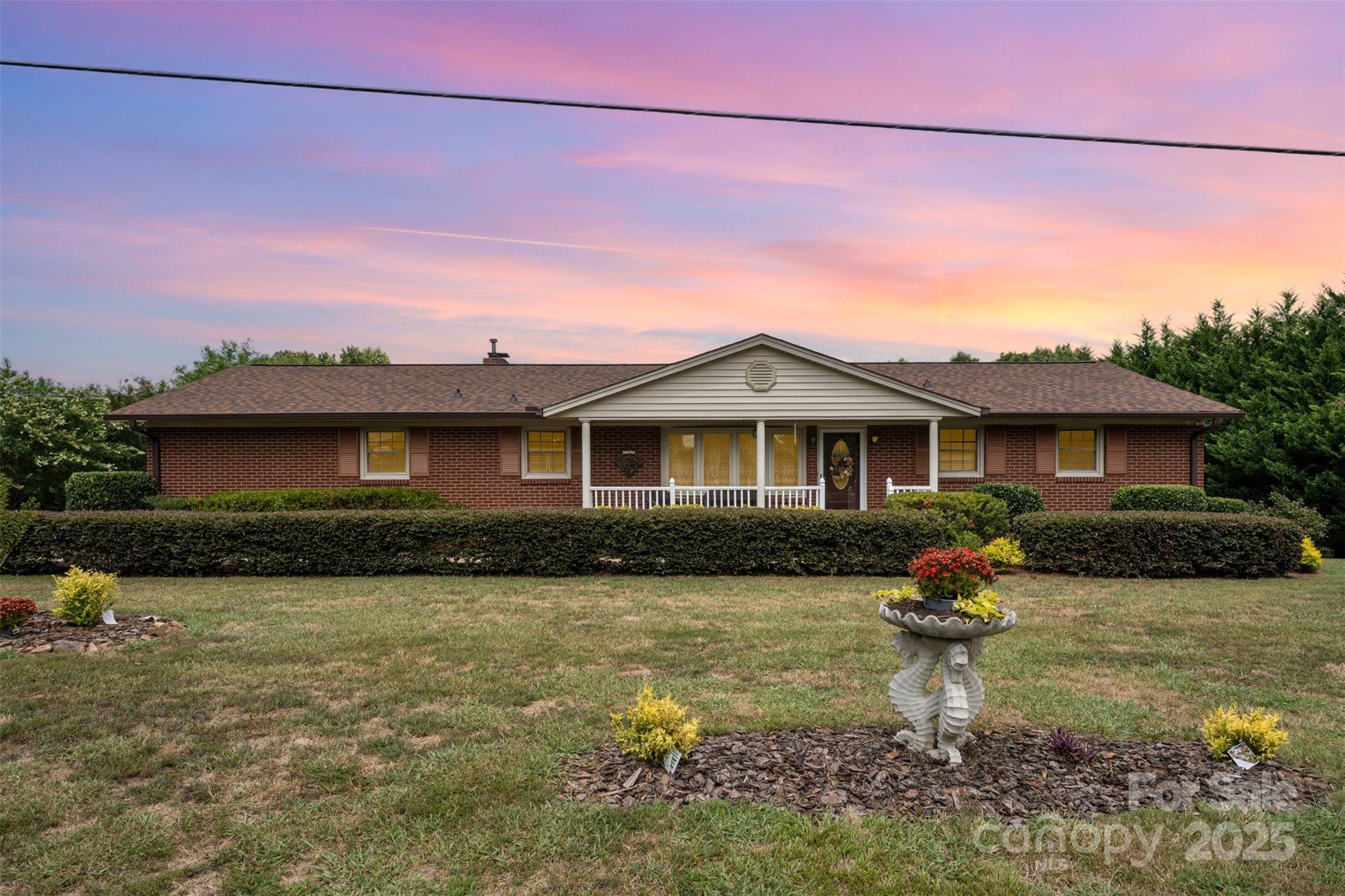 2236 Old Hickory Grove Road Mount Holly, NC 28120 - Photo 27 of 27 a front view of a house with a yard
