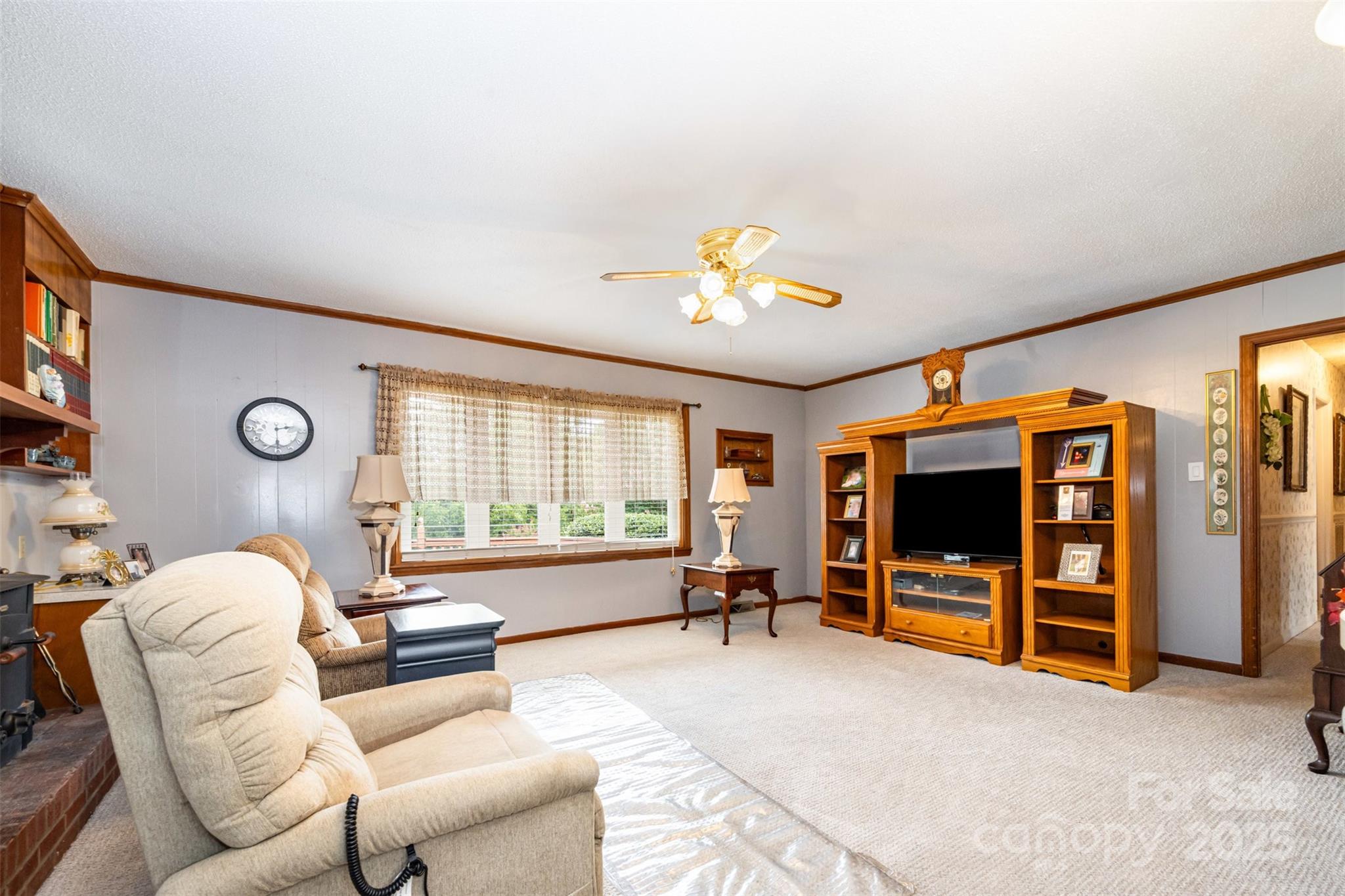 2236 Old Hickory Grove Road Mount Holly, NC 28120 - Photo 4 of 27 a living room with furniture and a flat screen tv