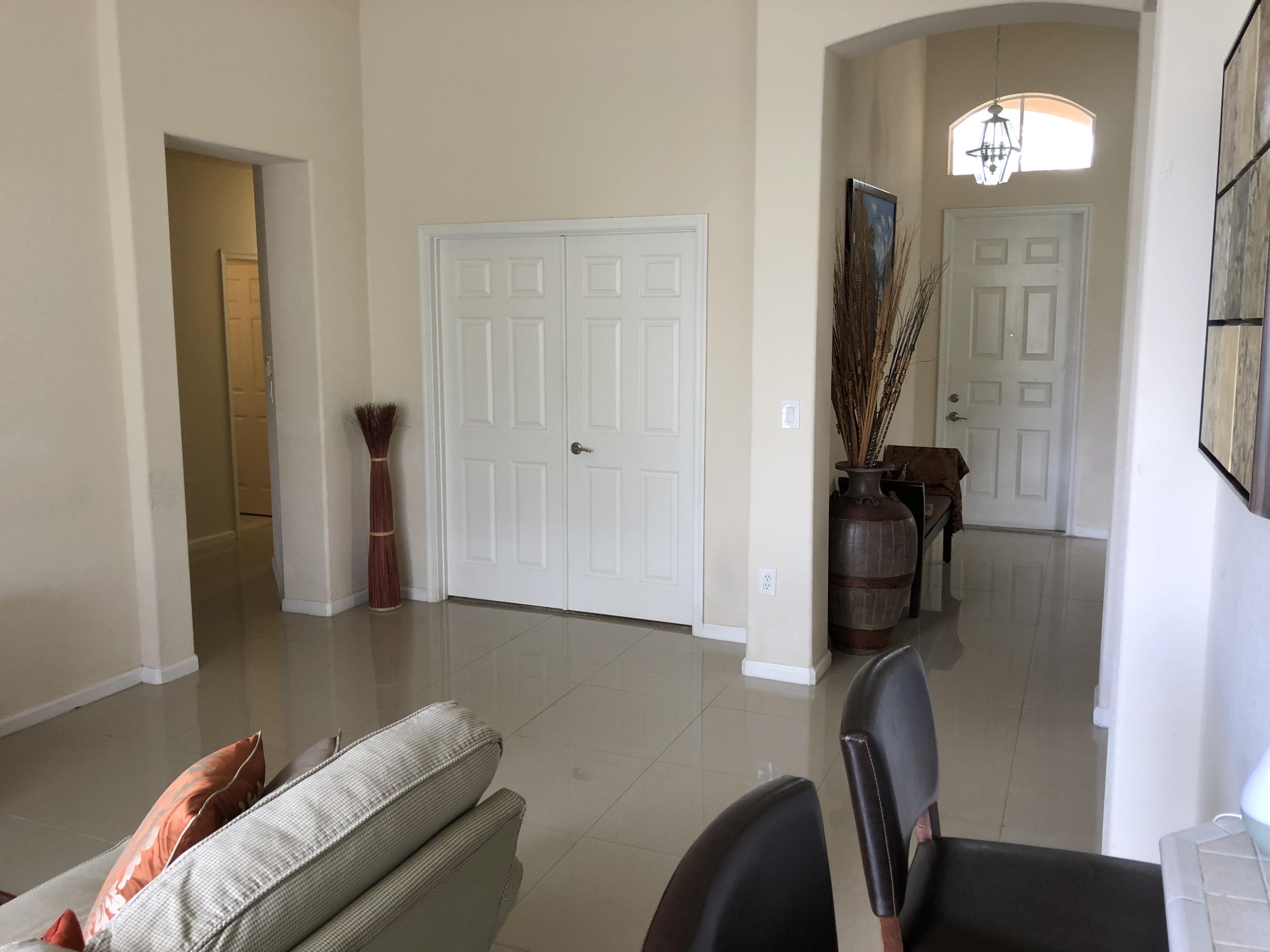 18805 Southwest 29th Street Miramar, FL 33029 - Photo 2 of 8 a view of a livingroom with furniture and a window