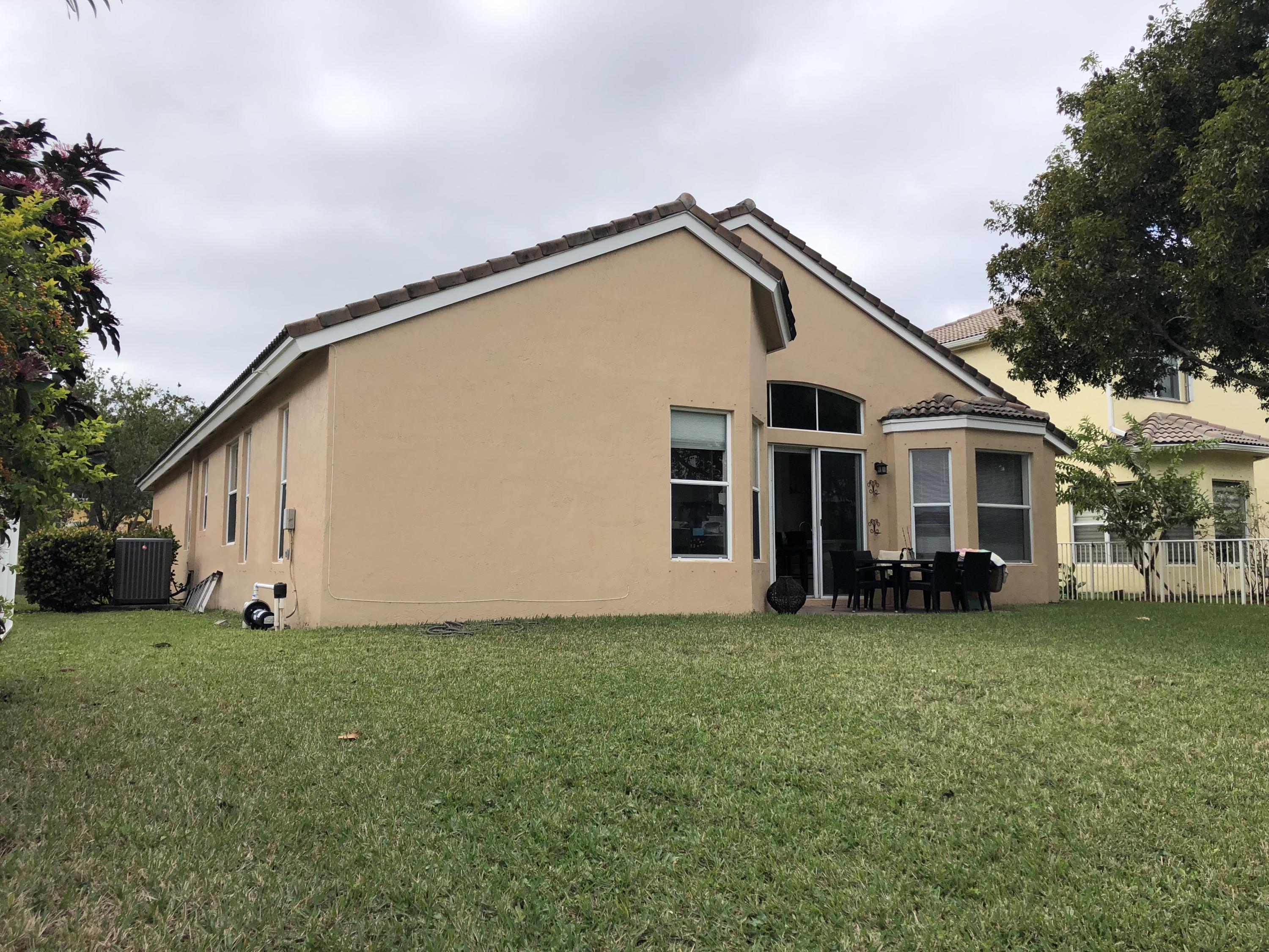 18805 Southwest 29th Street Miramar, FL 33029 - Photo 6 of 8 a view of a house with a yard