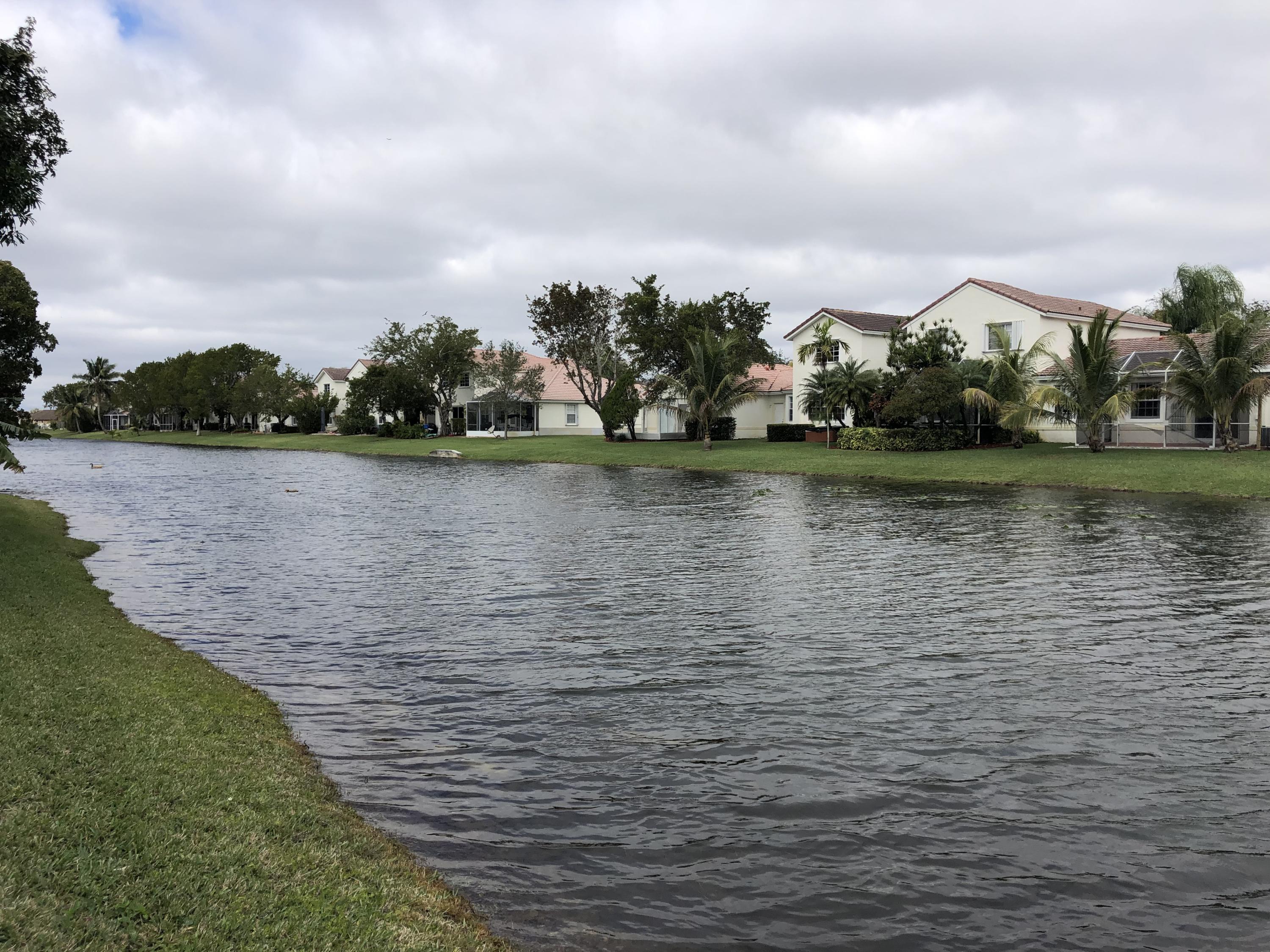 18805 Southwest 29th Street Miramar, FL 33029 - Photo 8 of 8 a view of a lake with houses in back