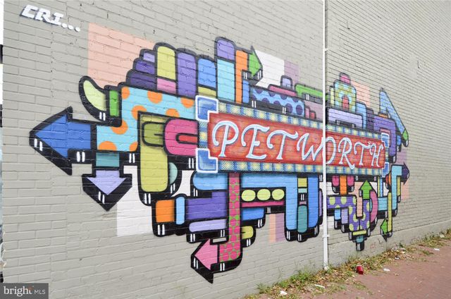 a view of a building with a tree