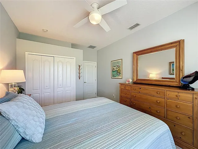 a view of a dining room and chandelier fan